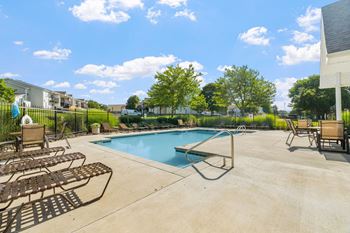 Sparkling outdoor pool with sundeck